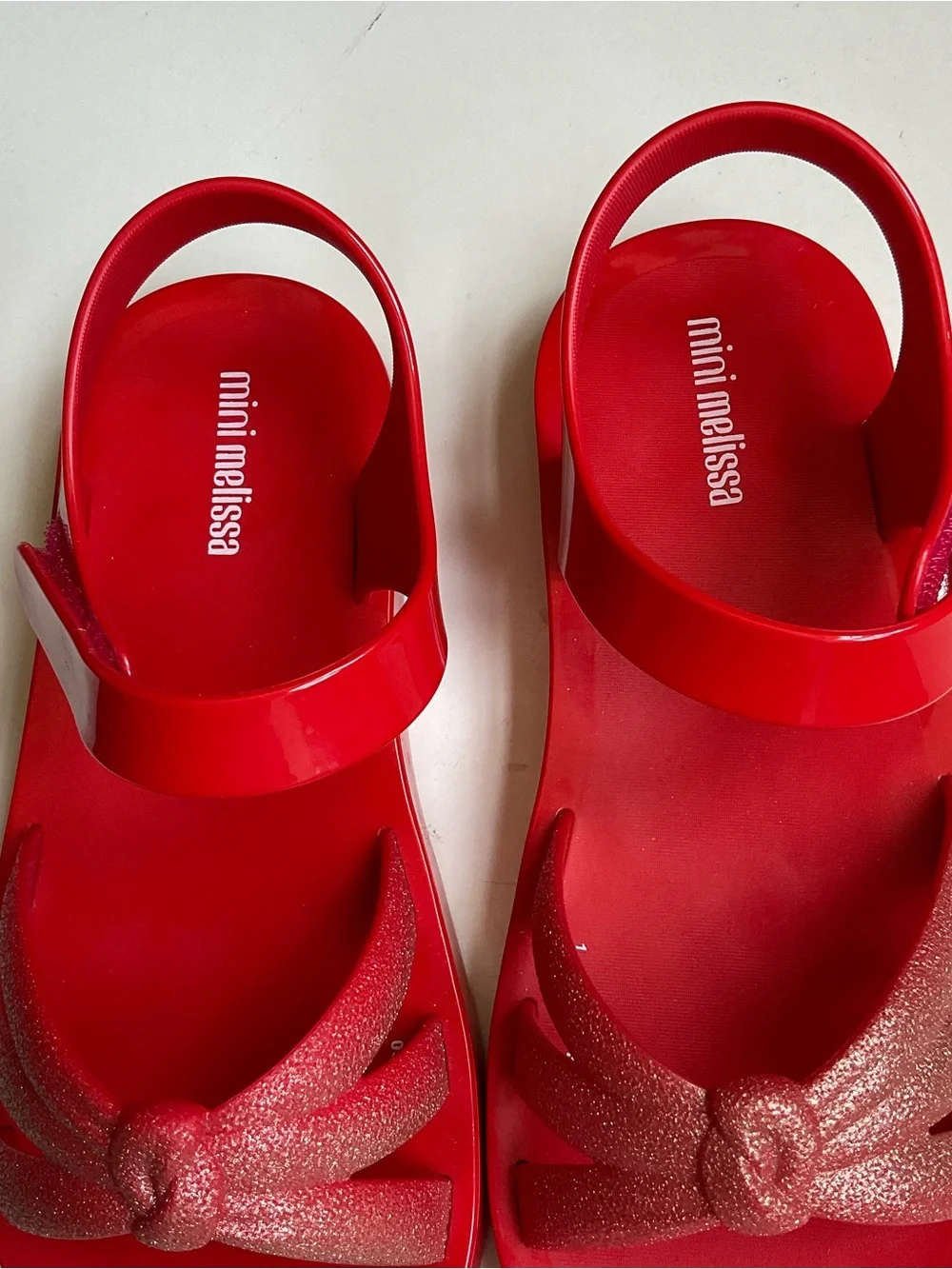 Mini Melissa Red Kids' Sandals with Glitter Bow Accent